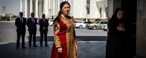Illustration for: Turkmenistan Bans Dark Clothing & Forces Women Into Bright Traditional Dress
