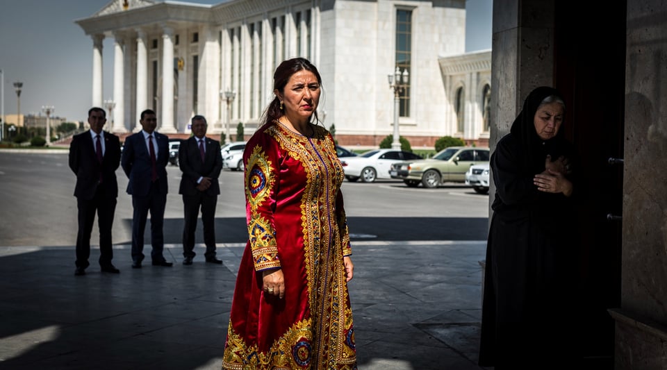 Illustration for: Turkmenistan Bans Dark Clothing & Forces Women Into Bright Traditional Dress